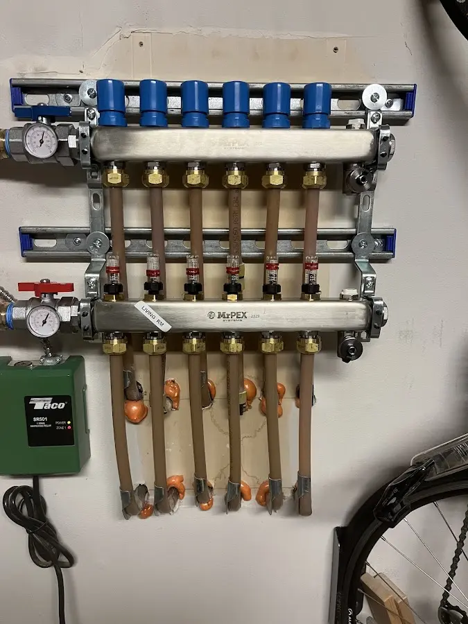 Plumber performing Gas Line Installation at a residential property in St. Peter